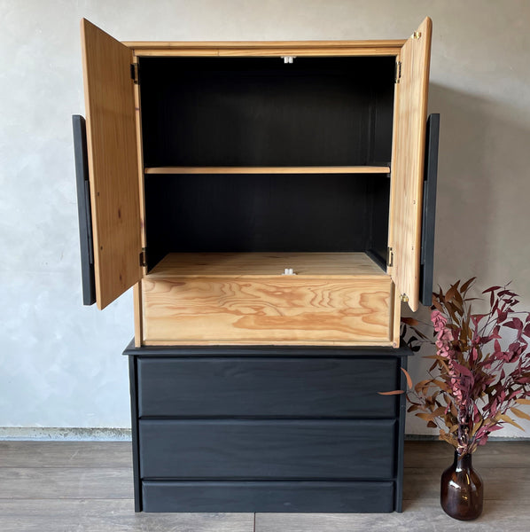 Cabinet doors open on a pine armoire finished with a two-toned look using Rubio Monocoat Precolor Easy and Oil Plus 2C.