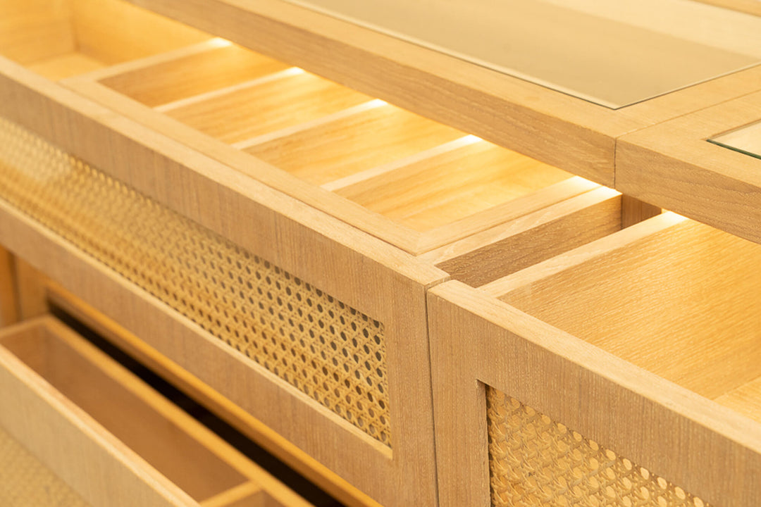 Oak cabinet drawers with rattan detail that were colored and protected using Rubio Monocoat Oil Plus 2C hardwax oil wood finish.