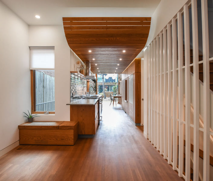 Hardwood flooring, cabinetry and a modern ceiling treatments all finished with a hardwax oil wood finish.
