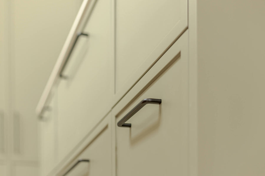Details on the kitchen drawers in the sage kitchen.