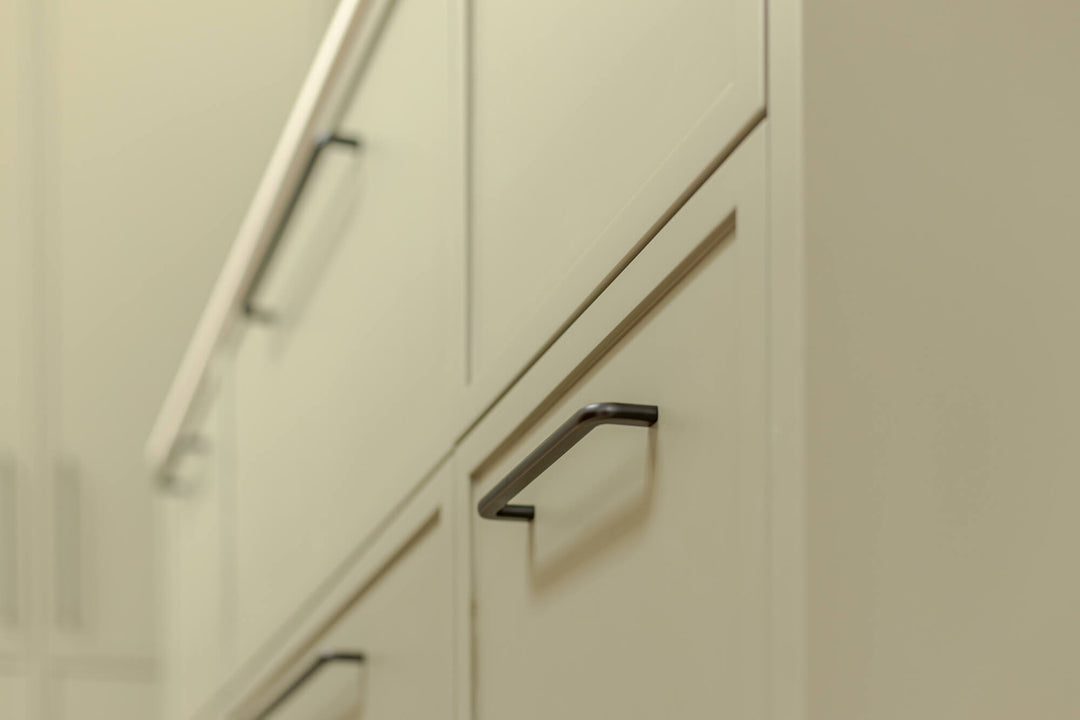 Details on the kitchen drawers in the sage kitchen.