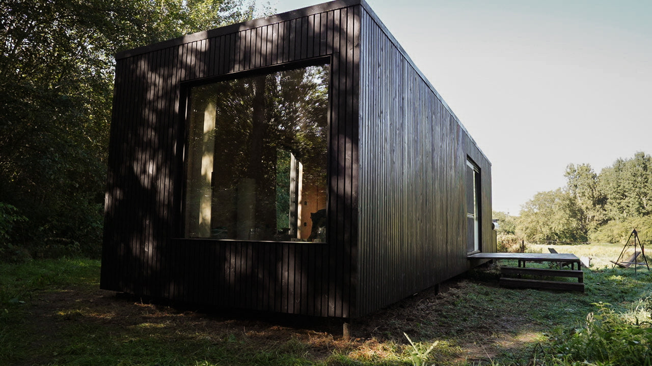 A wood-clad cabin finished with a strong and tough exterior wood finish from Rubio Monocoat called DuroGrit.