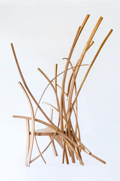 An oak story telling chair made from strips of oak wood. 