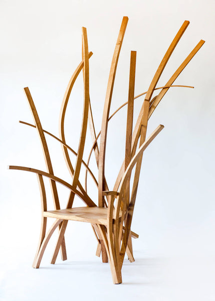 A large chair meticulously crafted from European oak strips finished using Oil Plus 2C Pure.