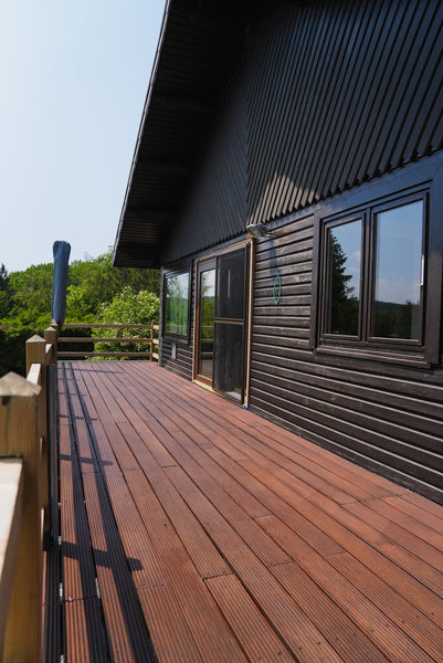A wood deck finished using DuroGrit "Steppe Look".