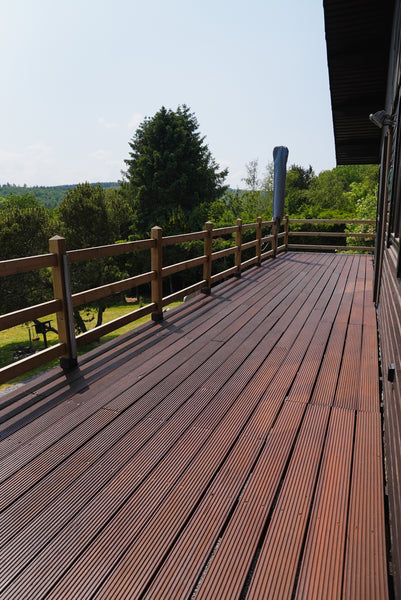 Wood decking finished with an extremely durable wood finish called DuroGrit 