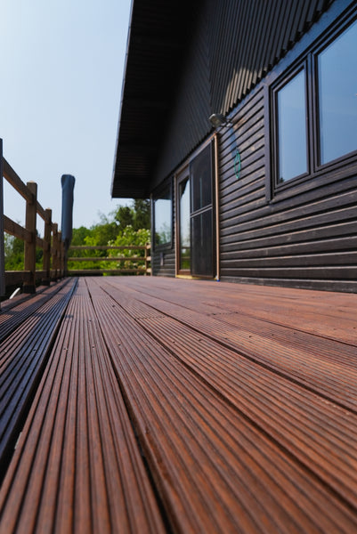 This warm-colored wood decking was finished with a mechanically tough exterior wood finish called DuroGrit to protect it from regular use and the elements. 