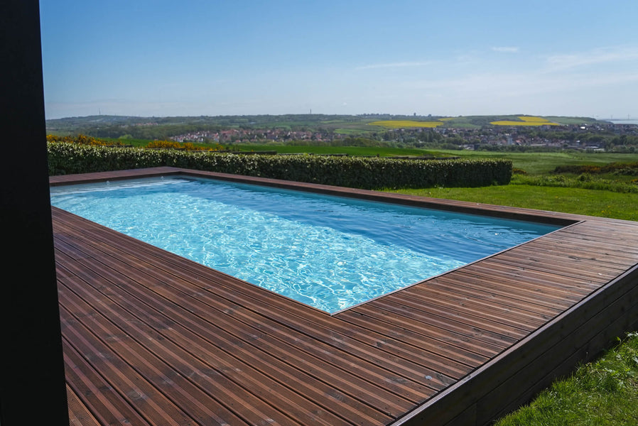 A pool deck made from pine wood finished using DuroGrit outdoor wood finish.