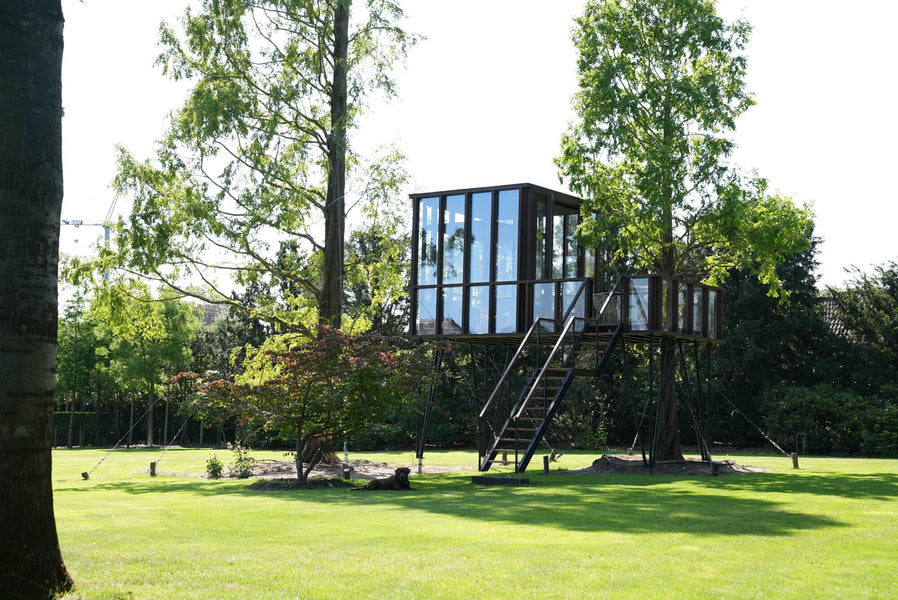 A tree house made from Afzelia wood finished using Rubio Monocoat DuroGrit.