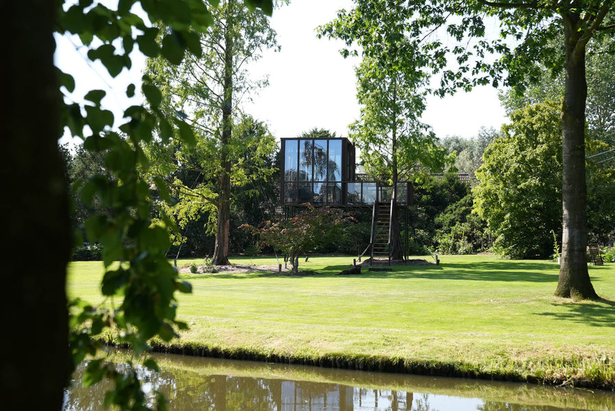 A modern tree house finished with a durable exterior wood finish called DuroGrit. 