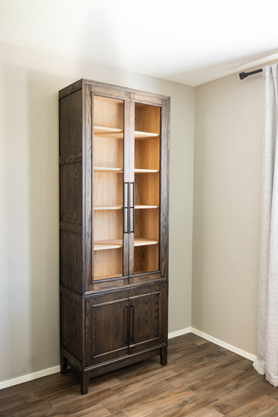 A handcrafted red oak bookcase with a contrasting finish of Rubio Monocoat products.
