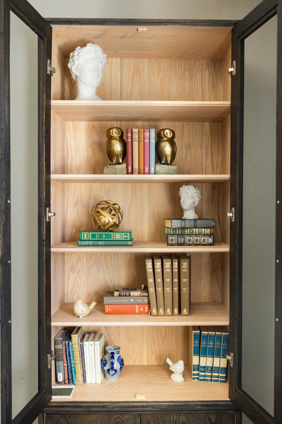 Styled shelves on a bookcase finished with Rubio Monocoat Oil Plus 2C.