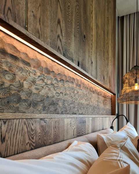 European oak wall paneling with a carved detail finished using Rubio Monocoat Oil Plus 2C "Black".