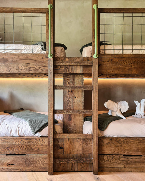 Bunk beds in a safari inspired home crafted from European oak and finished using Rubio Monocoat Oil Plus 2C "Black".