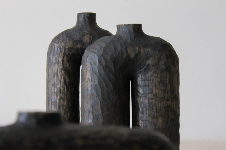 Two wooden vases finished with Rubio Monocoat hardwax oil wood finish.
