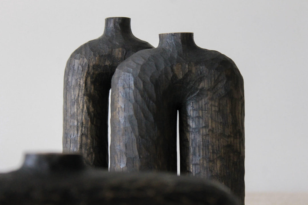Two wooden vases finished with Rubio Monocoat hardwax oil wood finish.