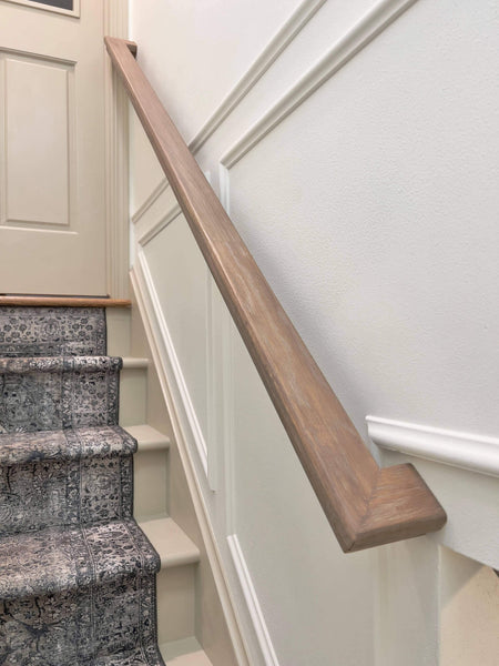 White oak stair railing finished with Rubio Monocoat water based wood stain and Oil Plus 2C.