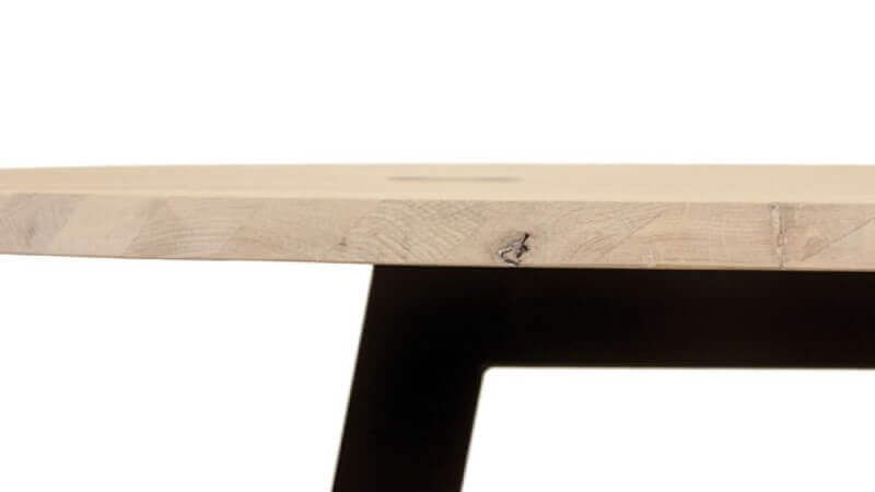 A side profile of a beech table finished with Rubio Monocoat hardwax oil wood finish.