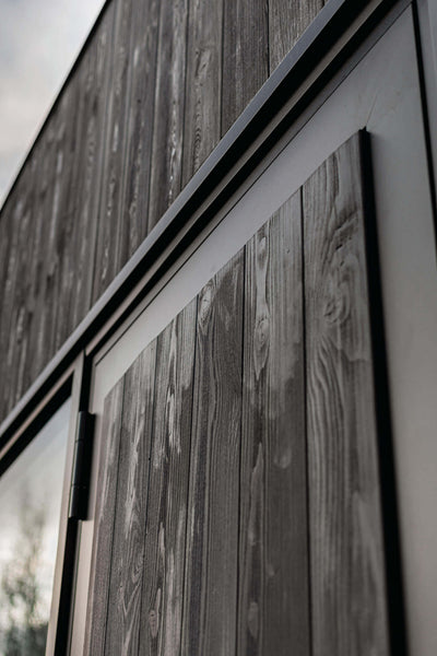 Rubio Monocoat's Hybrid Wood Protector used to protect exterior beech wood cladding.