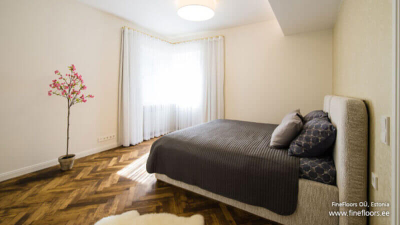 Bedroom with wooden floors finished with Rubio Monocoat.