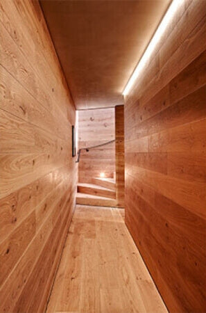 A wooden hallway in a ski resort.