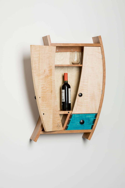 Unique wooden liquor cabinet finished with Rubio Monocoat.