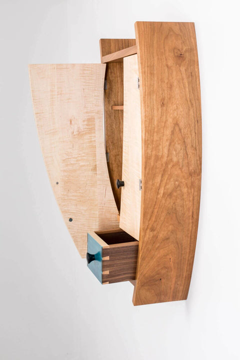 Wooden liquor cabinet opened up and finished with Rubio Monocoat.
