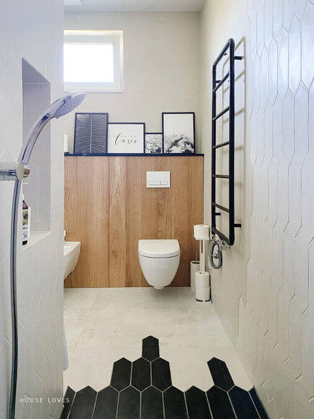 Wood and tile in a bathroom.