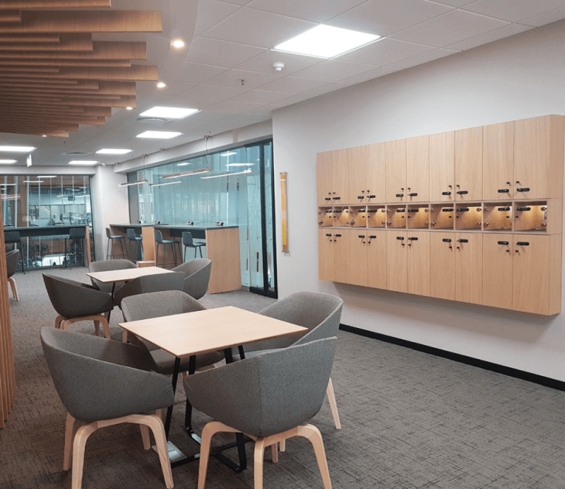 Workspace in a shared office with wood cabinets, tables and furniture which were all finished with Rubio Monocoat hardwax oil.