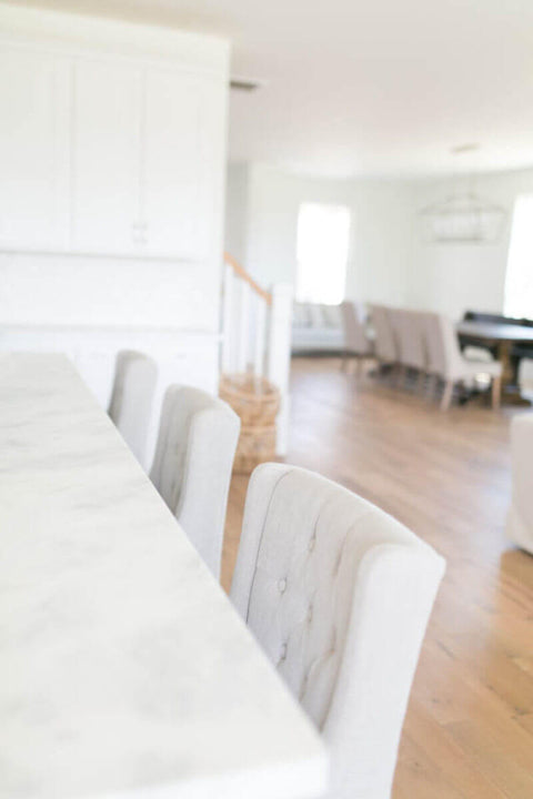 Table in house featuring wood floors finished with Rubio Monocoat.