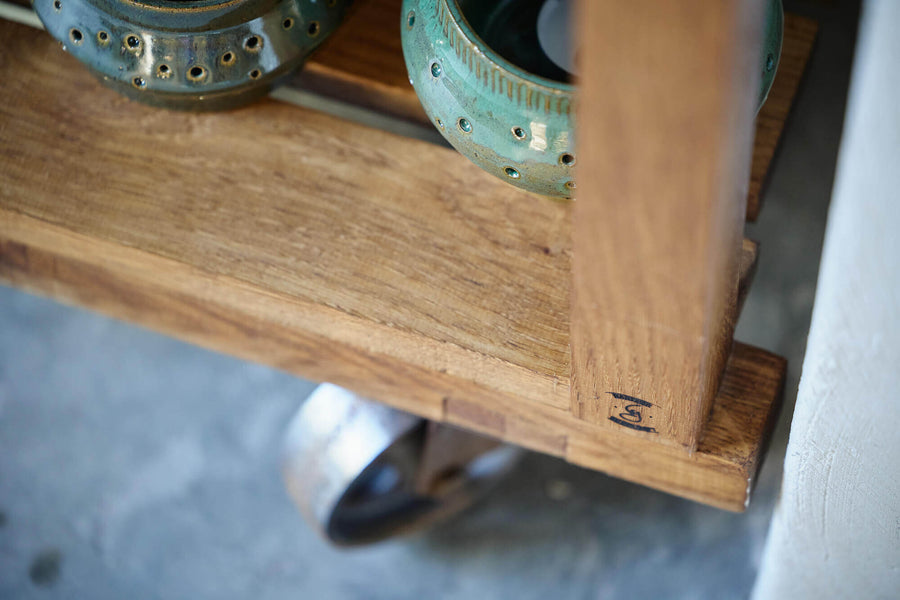 Oak shelving handcrafted using traditional wood joinery methods.