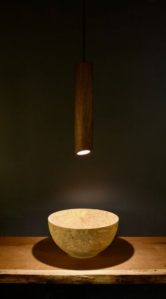Lavaro lighting pendant made from Walnut wood.