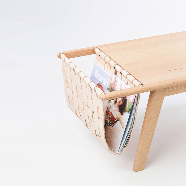 Coffee table with built in magazine holder.