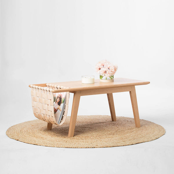Coffee table with built in magazine holder.