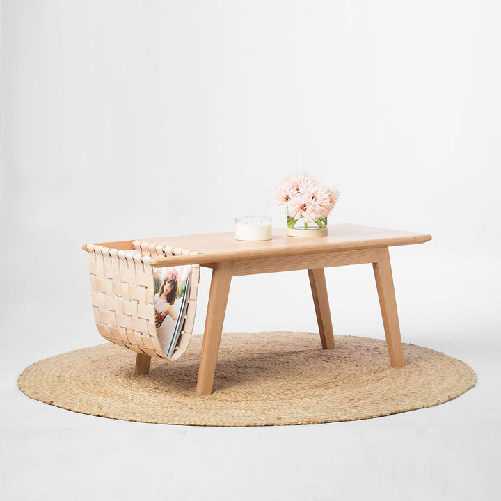 Coffee table with built in magazine holder.