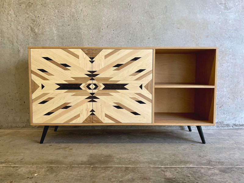 A custom credenza with tribal pattern cabinet doors, made from solid maple, white oak, and wenge.