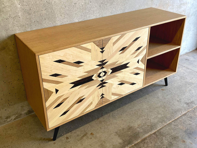 A credenza with patterned cabinet doors, made from solid maple, white oak, and wenge.