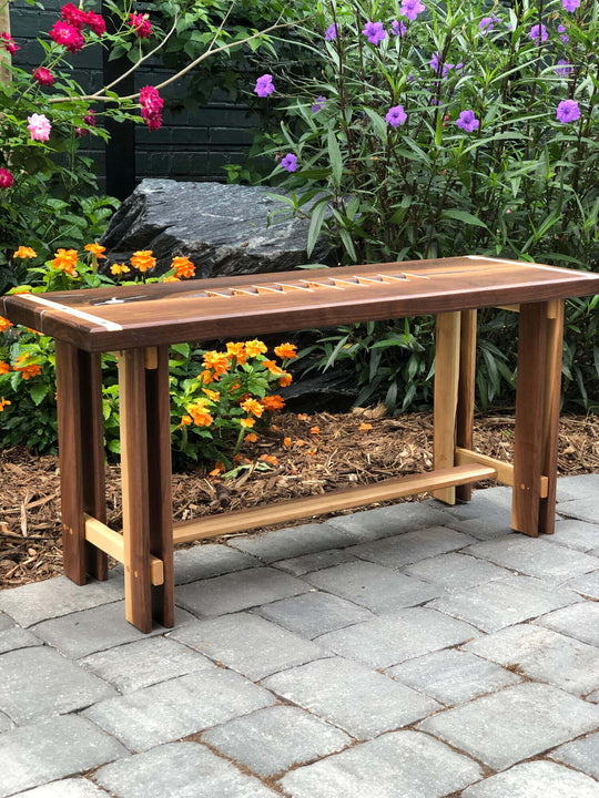 Walnut bench with hard maple inlays finished with a hardwax oil wood finish.
