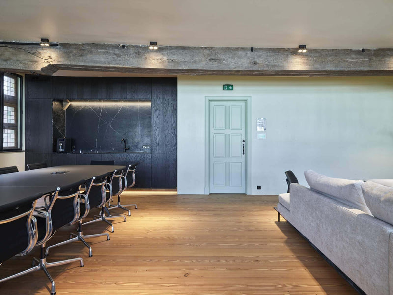 Natural looking wood floors in a conference room.