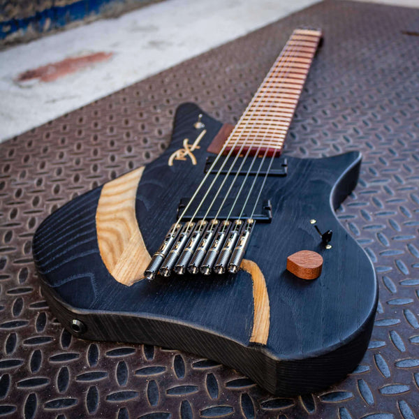 Ash, kekatong, maple and padouk wood guitar.