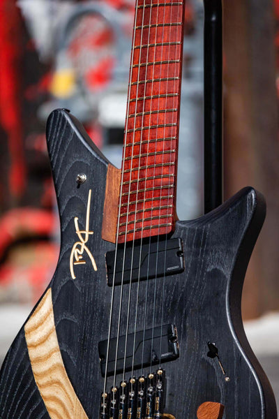 Matte electric guitar wood finish.