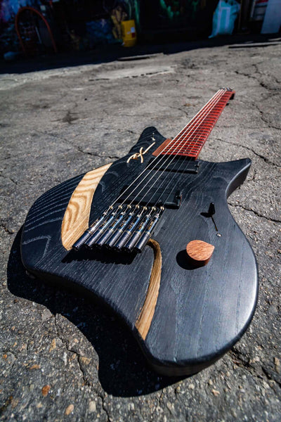 Matte electric guitar body.
