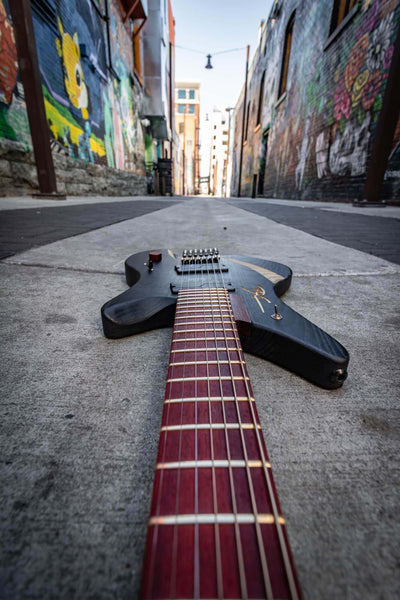 Kekatong and maple fretboad on 7 string guitar.
