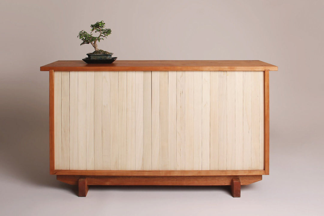 Poplar and cherry wood cabinet.