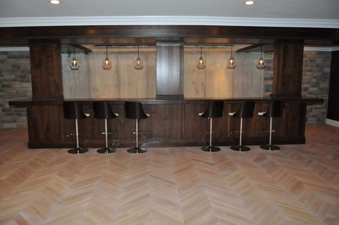 Chevron white oak floors finished with Rubio Monocoat products.
