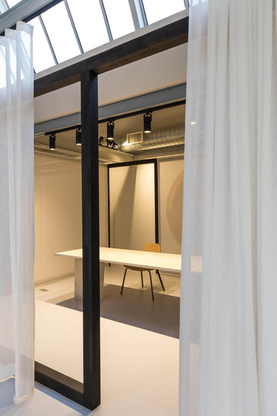 Conference room with luxurious curtains as dividers.